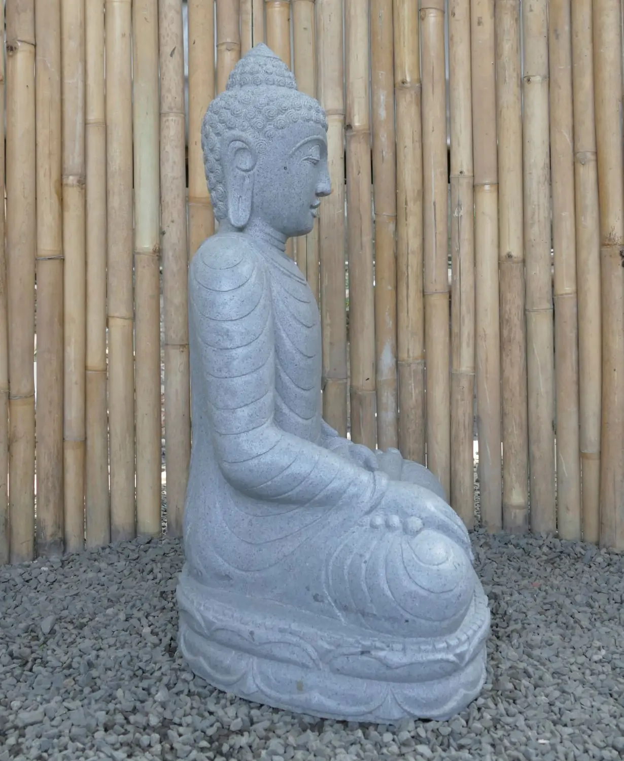  Product image 4 of the product “Seated Buddha made of Riverstone in Bhumisparsha - gesture of touching the earth. 80cm height. ”